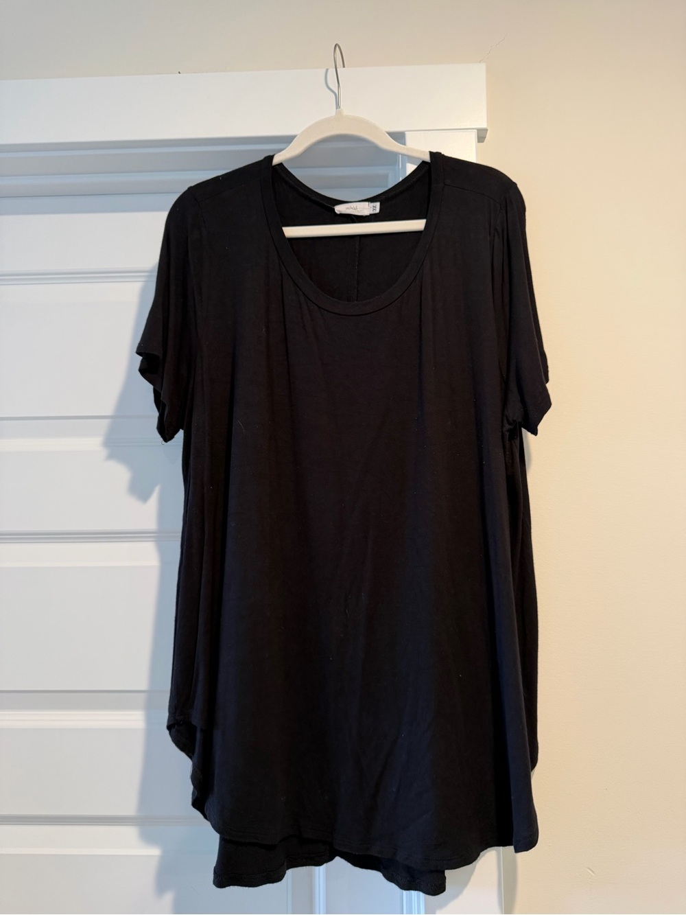 Women’s Black Scoop Neck Short Sleeve Top with Layered Hem